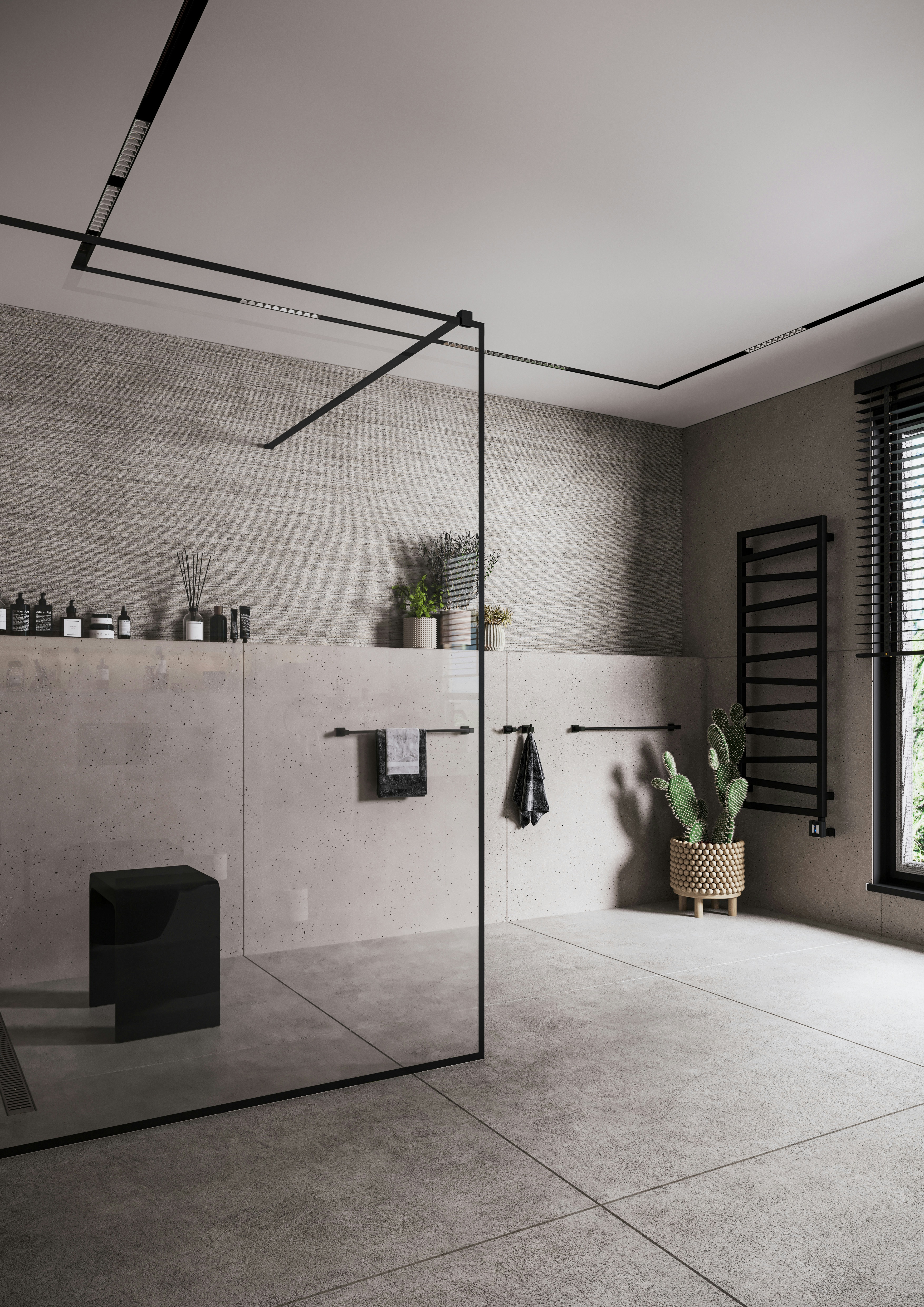 Modulare Fahrradbarriere aus Metall in Schwarz-Grau am urbanen Uferweg, mit Fahrrad-Symbol